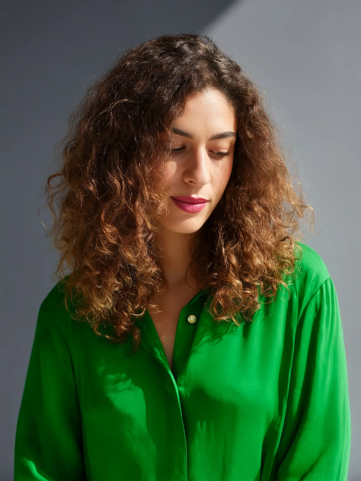 Chestnut Brown Natural Curls with Sun-Kissed Highlights